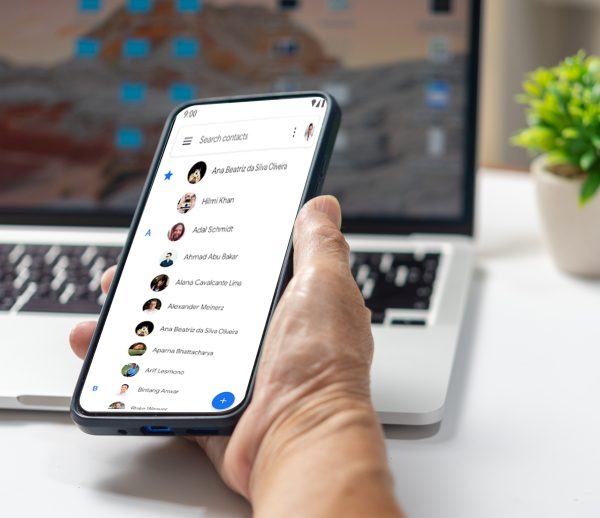 Person sharing a referral from a phone